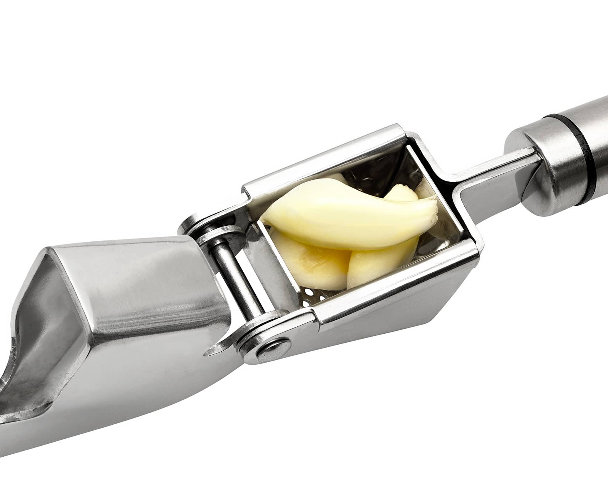 Close view of Garlic inside the large chamber of Benchusch Professional Garlic Press