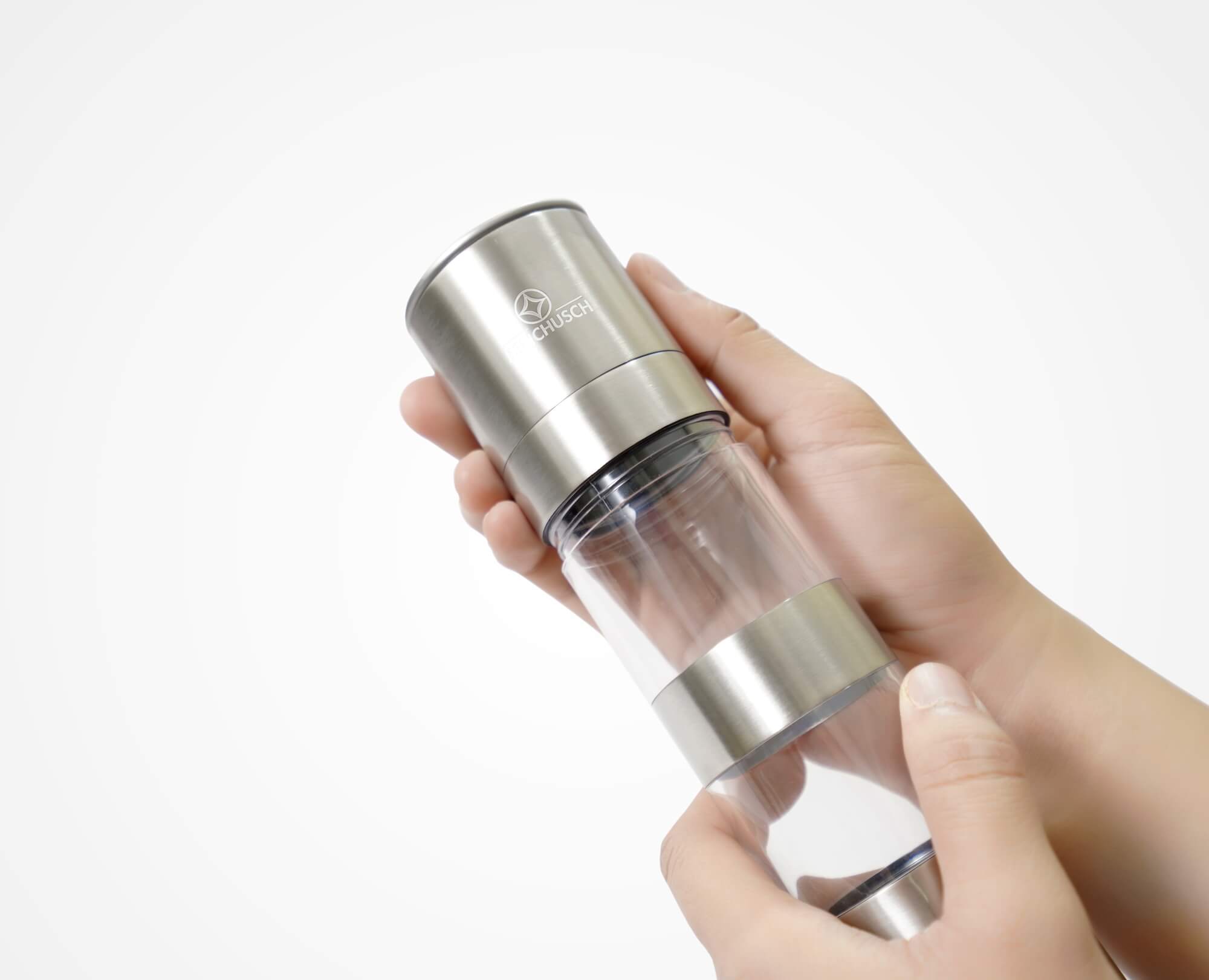 Opening the cover of Benchusch Modern 2 in 1 Salt and Pepper Grinder