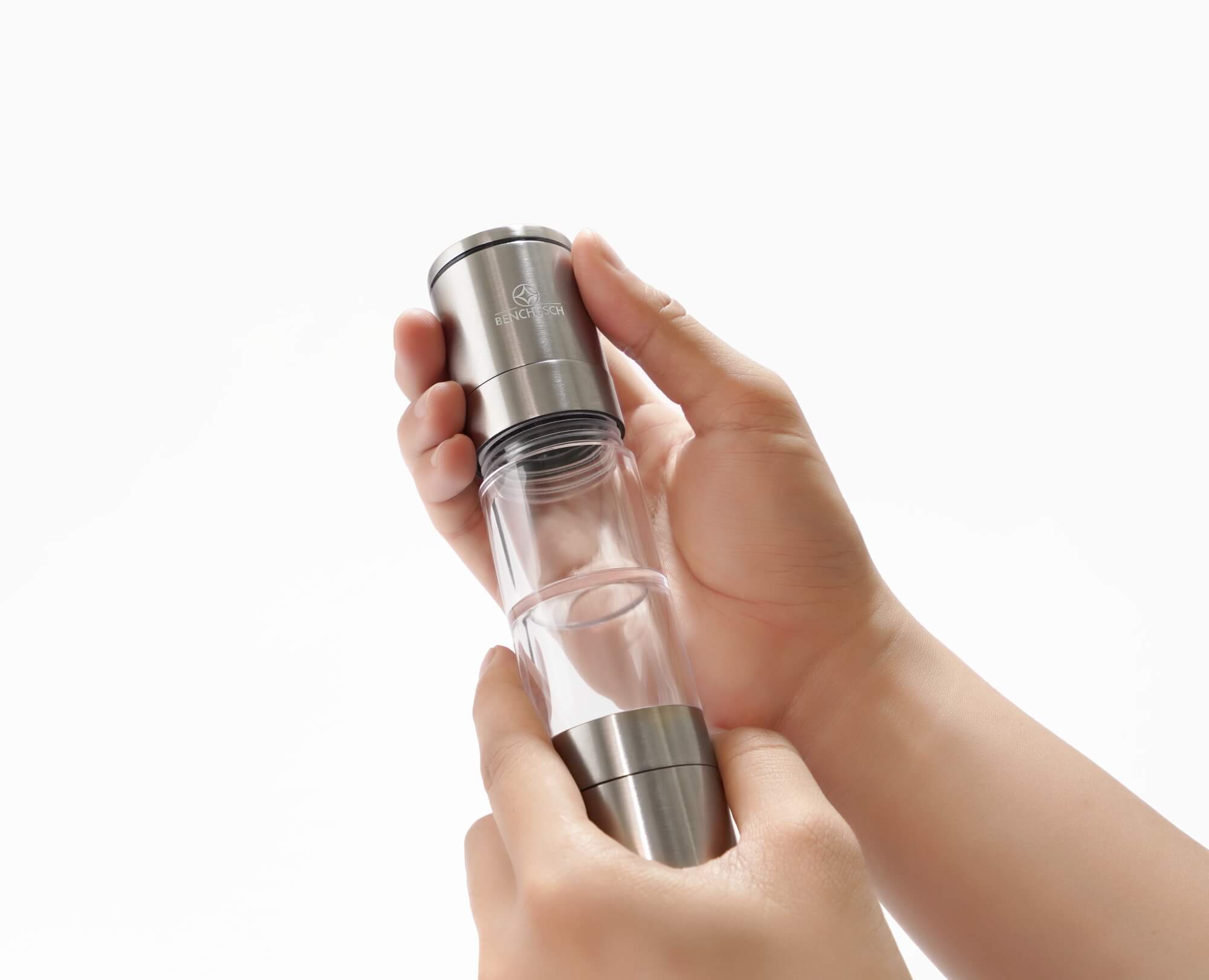Opening the cover of Benchusch Compact 2 in 1 Salt and Pepper Grinder