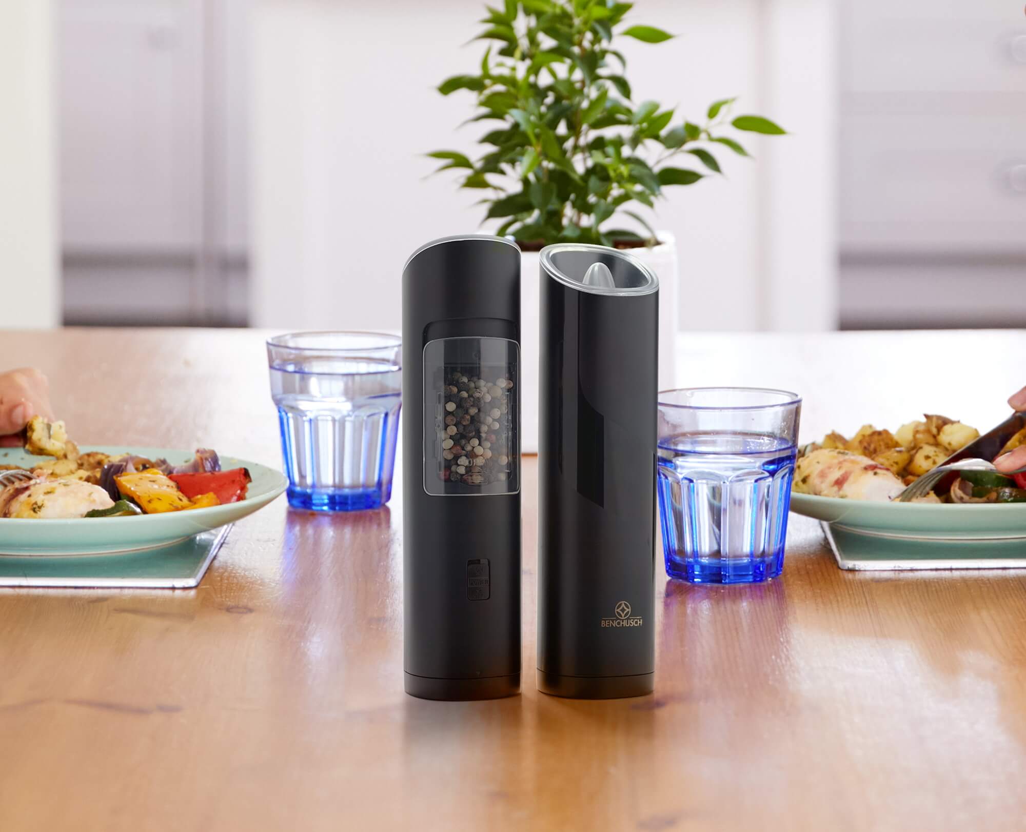 Benchusch Modern Electric Gravity Pepper Grinder with pepper on the dinning table